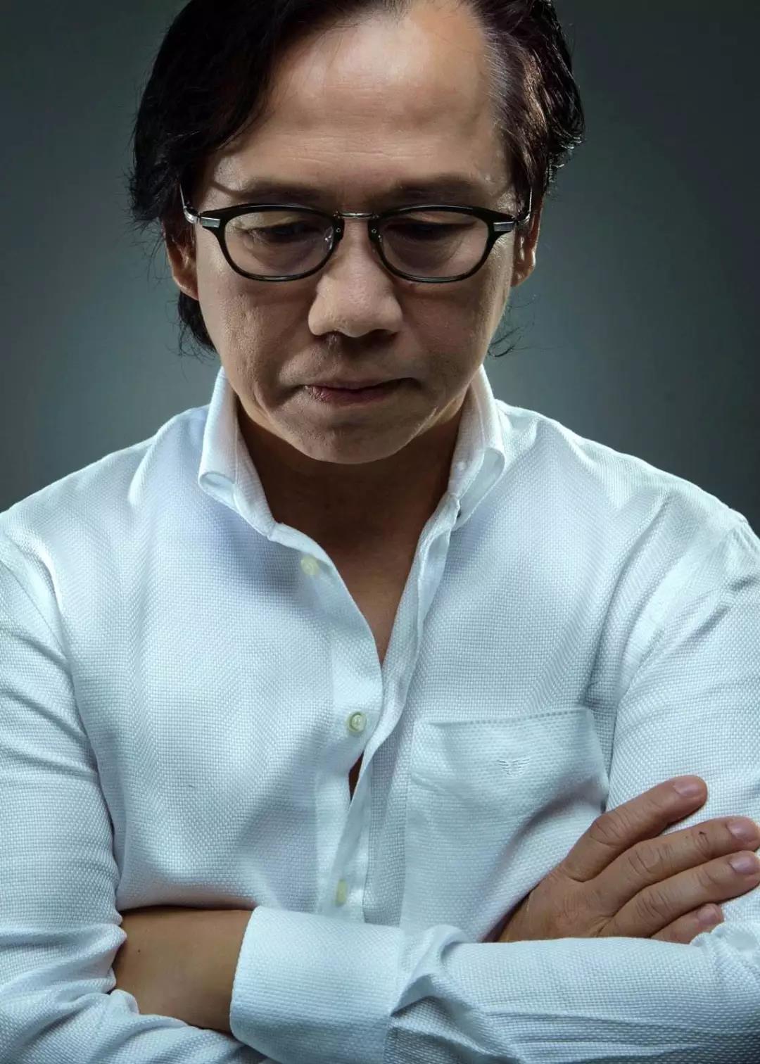 梁景華